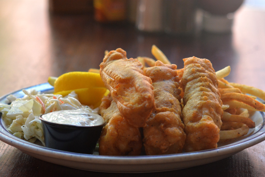 Beer-battered fish and chips with coleslaw